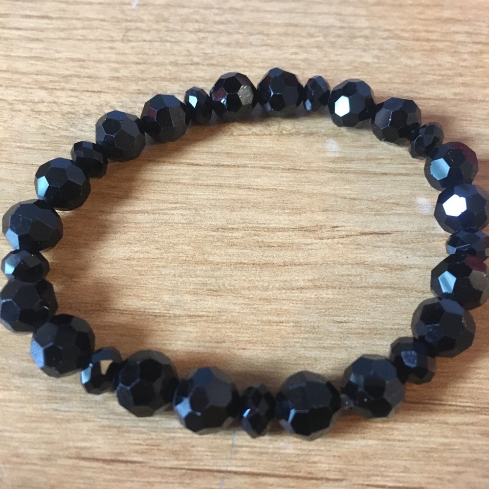 Black beads bracelet.